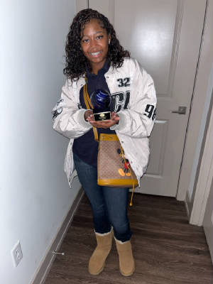 ULMII_2022_TiarahWilliams_with_ULMIIAward.jpg
